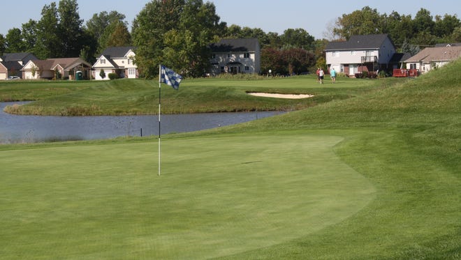 The seventh green in the foreground and eighth green in the background at the Links at Gateway in Romulus.
