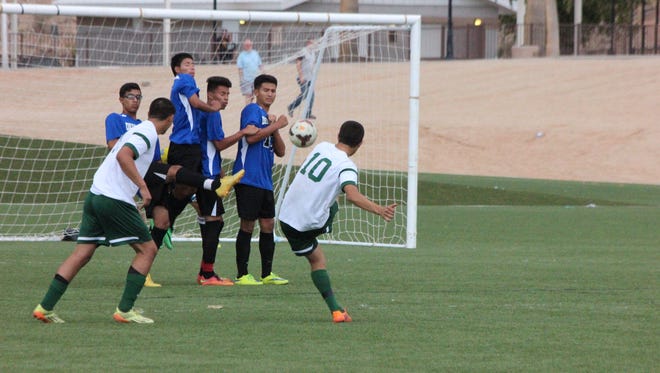 VVHS' Moises Medina launches a direct kick during a recent game.