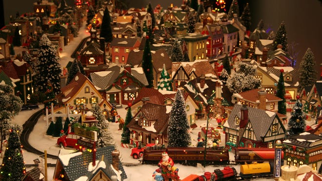 Monroe man creates 200-building mini Christmas village