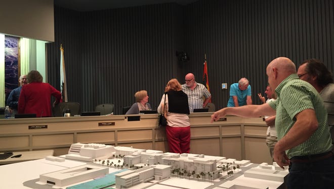 Palm Springs residents view a model of the downtown redevelopment during Thursday's planning commission meeting.