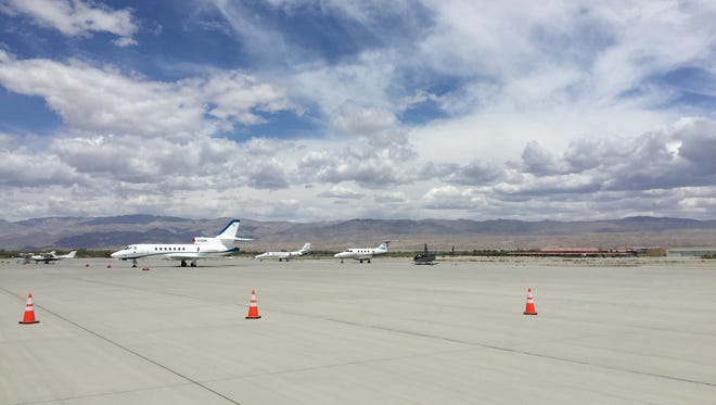Planes sit out on the tarmac at Jacqueline Cochran Regional Airport in Thermal, where Desert Jet plans to build a new terminal and hangar facility, in April 2016.