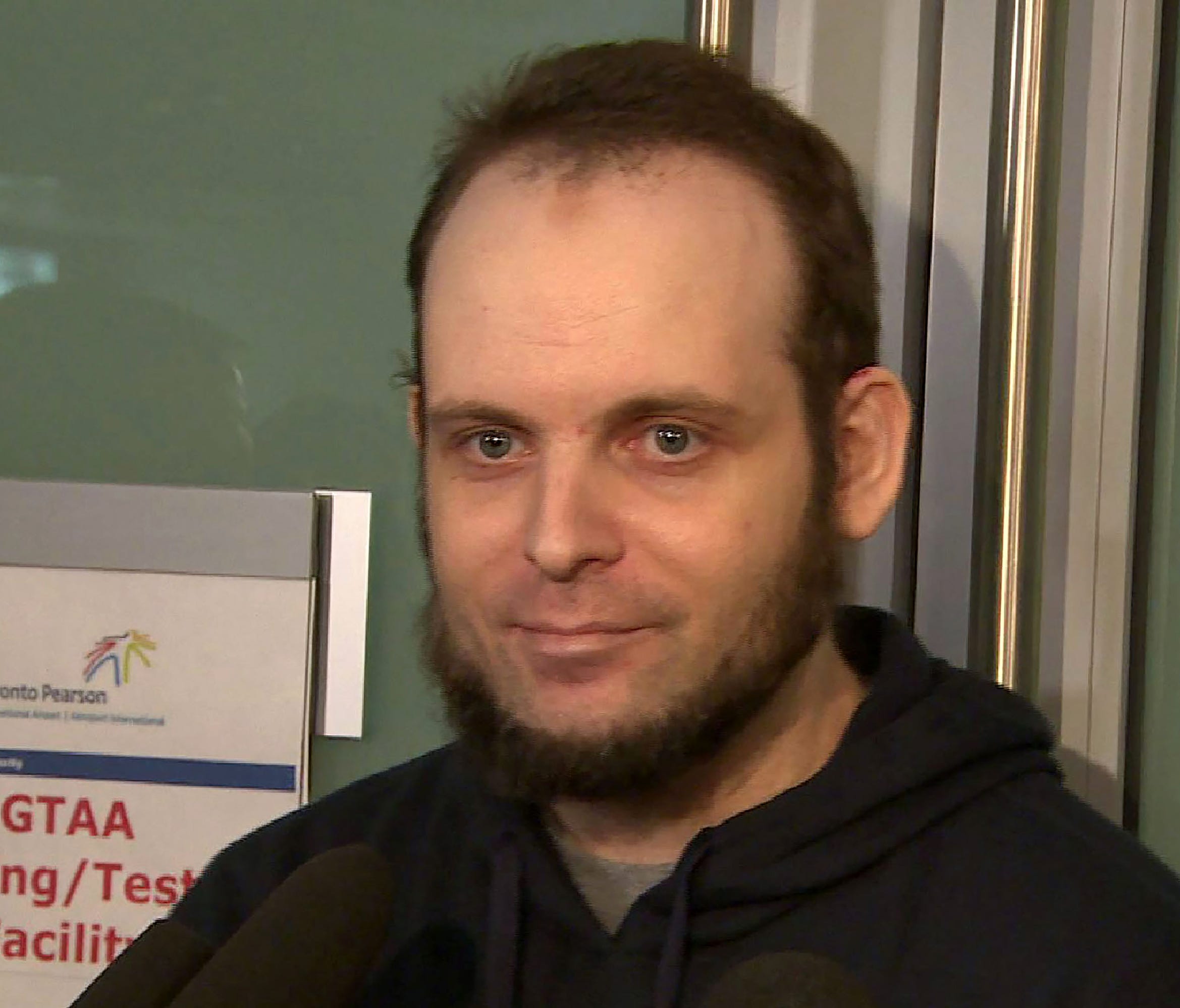 Freed Canadian hostage Joshua Boyle gives an interview Nov. 14, 2017, to CBC News upon his arrival at Toronto Pearson international airport.