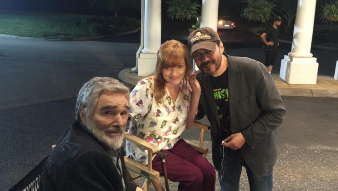 Burt Reynolds, Amy Hoerler, a student in Reynolds' Master Class at the Burt Reynolds Institute for Film and Theatre, and writer/director Adam Rifkin are on the set of "Dog Years" a film being made in Knoxville, Tenn. with Chevy Chase and Ariel Winter, known to audiences for her role on the television series "Modern Family."