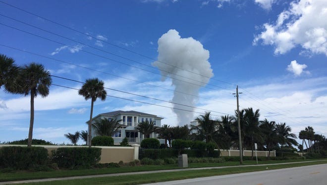 Smoke rises after officials deal with ordnance found Friday, Aug. 11, 2017.