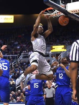 Nevada's Jordan Caroline dunks while taking on Air Force during their game at Lawlor Events Center on Wednesday.