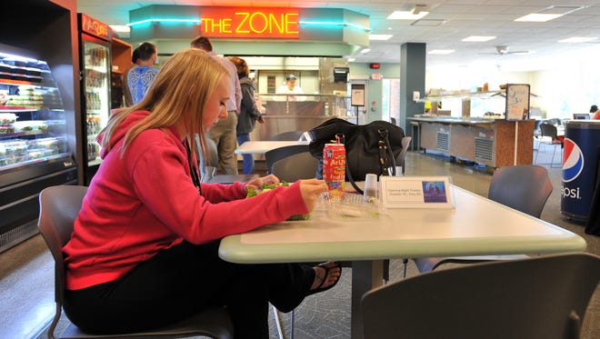 Lindsay Doherty, an Ohio University Lancaster sophomore, eats lunch Tuesday in The Zone in Lancaster. The student lounge and food court will undergo renovations soon.