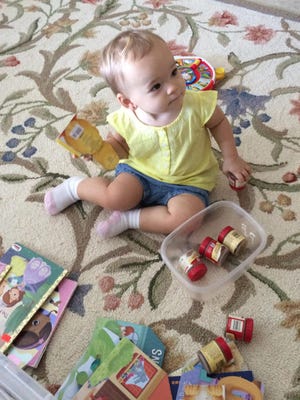 Isabella has all the toys and books a kid could want, but what does she play with? Grandma's spices. She likes the rattling sound.
