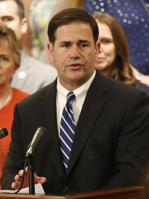 Gov. Doug Ducey announces his plan to raise teachers pay by 20 percent over the next two years at the State Capitol in Phoenix on April 12, 2018.