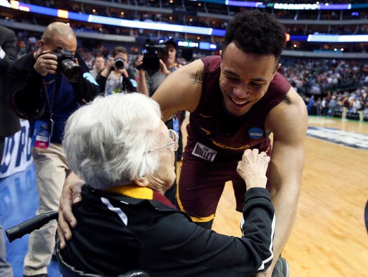 Loyola (Il) Ramblers guard Marques Townes (5) hugs