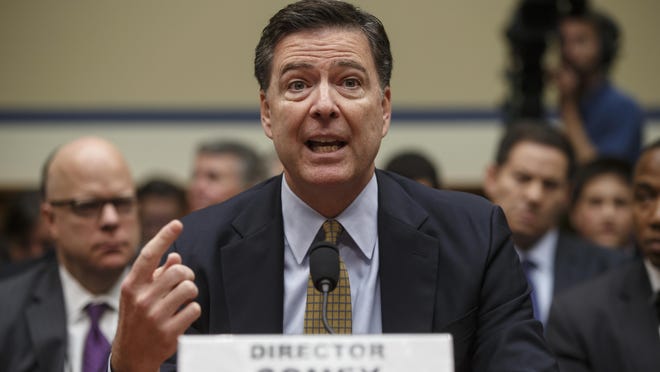 FILE - In this July 7, 2016, file photo, FBI Director James Comey testifies before the House Oversight Committee about Hillary Clinton's email investigation, at the Capitol in Washington. The House intelligence committee is to begin hearings Monday, March 20, 2017 into Russiaâs role in cybersecurity breaches at the Democratic National Committee, as well as President Donald Trumpâs unsubstantiated claim that his predecessor had authorized a wiretap of Trump Tower. Comey and Mike Rogers, the director of the National Security Agency, are slated to testify. (AP Photo/J. Scott Applewhite, File)