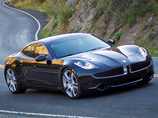 The 2011 Fisker Karma, Henrik Fisker's first automotive venture, was a dramatic plug-in hybrid. But battery and financial problems eventually caused the company to go bankrupt. It has been revived by a Chinese company.