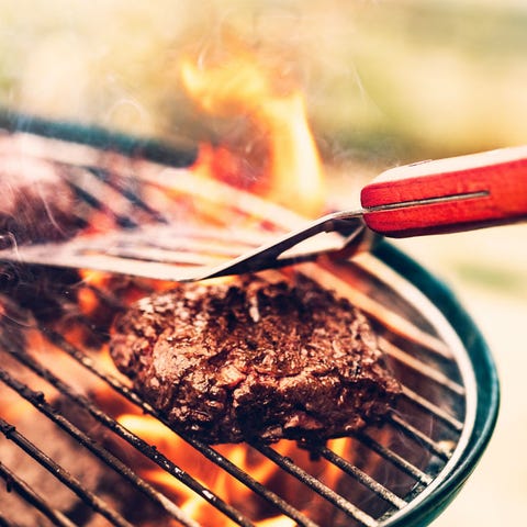 Summer means grilling -- lighting the hardwood cha