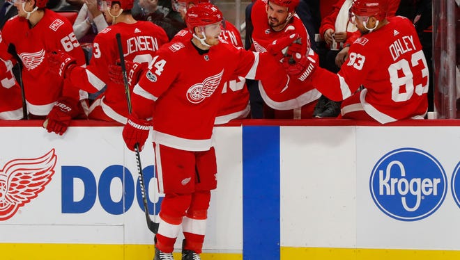 Detroit Red Wings' Gustav Nyquist (14) celebrates his goal against the Winnipeg Jets in the first period of an NHL hockey game Tuesday, Dec. 5, 2017, in Detroit.