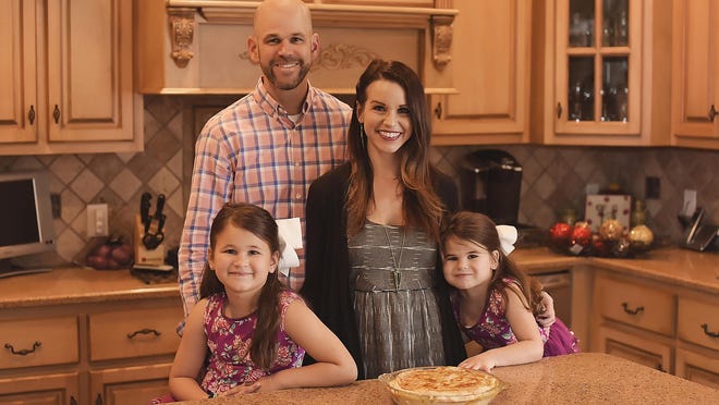The Hammond family (left to right,) Emi, Stephen, Cecilia and Avery, in the kitchen with pascualina fresh from the oven.