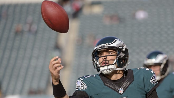 Mark Sanchez warms up for Sunday's game vs. the Titans.