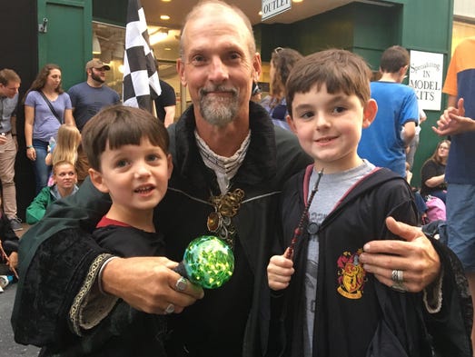 Wearing their Hogwarts robes, Emerson and Wesley Thomas,