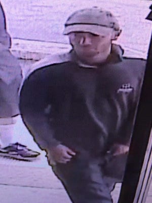 Simi Valley police are seeking the public's help in identifying the person depicted in this surveillance image and who authorities say was involved in the robbery of a pawn shop on Friday.