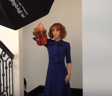 Comedian Kathy Griffin poses with a fake decapitated head of President Trump.