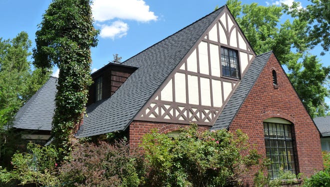 Owners of this 1927 Frederic DeLongchamps-designed home located at 575 Ridge Street used a Neighborhood Preservation Fund grant to replace the roof.
