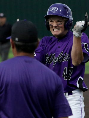 Abilene Wylie's Balin Valentine celebrates his RBI and single against Iowa Park Friday, May 18, 2018, in Iowa Park. Wylie defeated Iowa Park 4-2 in Game 1 of the Region I-4A quarterfinals.