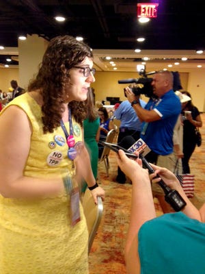 Transgender Florida delegate Monica DePaul speaks to reporters Wednesday.
