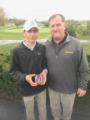 Franklin D. Roosevelt golfer Jeffrey Peters with coach Kevin Hart after winning the Mid-Hudson Athletic League golf title on Oct. 13, 2016.