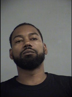 Donald E. Bell, 34, has been arrested in connection with an April shooting in the Chickasaw neighborhood.