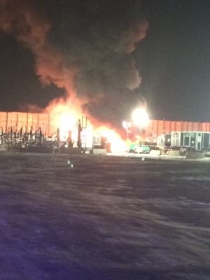 Crews responded to a fire at an oil and gas site near Windsor on Friday night.
