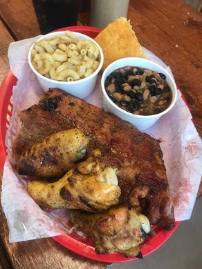 Yummy Bones Bbq Grows From A Tent In Gas Station To Two Restaurants Yummy Bones Bbq S With Baby Back Ribs And Wings Alongside