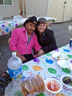 
Salinas police released this photo of homicide suspect Florencio Anselmo, left, and Maria Ceja. 
