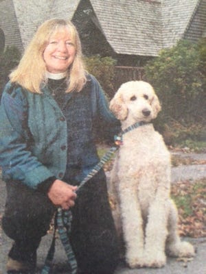 The Rev. Martha G. Kirkpatrick with her dog, Annie.