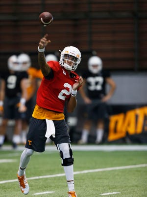 Quarterback Jarrett Guarantano throws to a receiver during practice Thursday, Aug. 31, 2017, in Knoxville, Tenn.