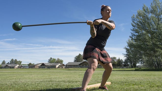 Kara Bonham practices for the Scottish hammer throw, a Highland Games staple, at Legacy Park on Thursday, June 15 , 2017. Contestants hurl a large metal ball, usually around 14 pounds or heavier, attached to the end of a shaft.
