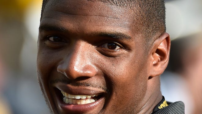 NFL rookie Michael Sam watches the game between the Missouri Tigers and the South Dakota State Jackrabbits during the second half at Faurot Field.