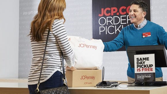 A shopper at one of J.C. Penney's online-order pickup desks.