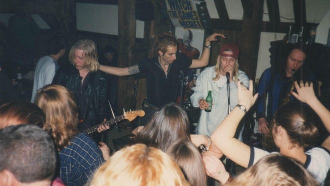 Jam sessions in the mid-'90s at the Bear's Den in Berkley were a key element in Kid Rock's development. Pictured at the left of Kid Rock is Vinnie Dombroski of the Detroit alt-rock band Sponge.