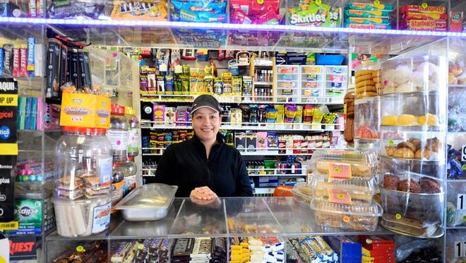 Lina Londono is the co-owner of Rimos Deli at South Pine and East Princess Street in York. Londono has two children and worries about the violence in the neighborhood. She says a shooting near the store last September really hurt business. Londono thinks it would help if parents in the neighborhood were more involved with their children. "Sometimes the parents don't care at all." 