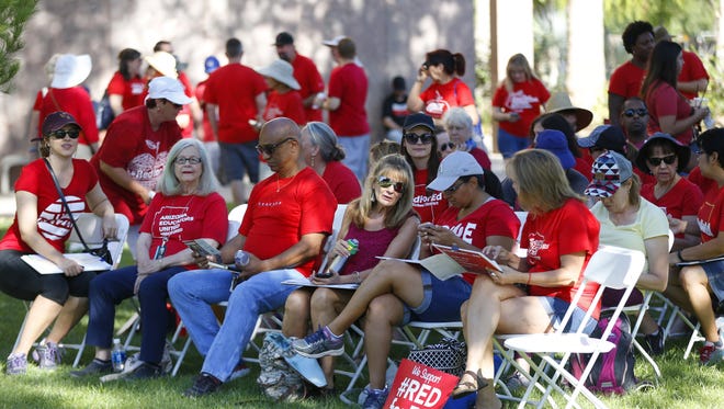 RedforEd supporters gather outside the State Capitol in Phoenix on June 23, 2018.