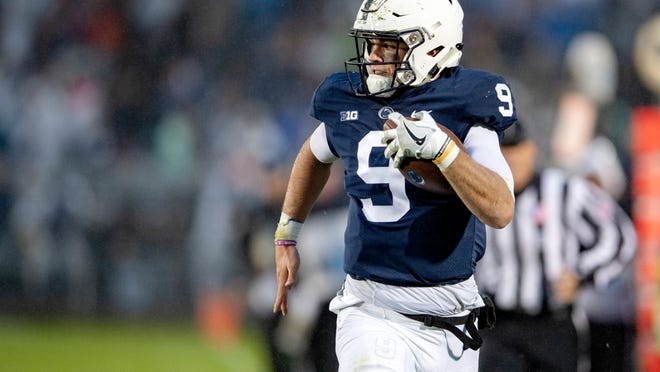 Penn State quarterback Trace McSorley runs 51 yards for a touchdown against Iowa during the first half of an NCAA college football game in State College, Pa., Saturday, Oct. 27, 2018. Penn State won, 30-24. (Abby Drey/Centre Daily Times via AP)
