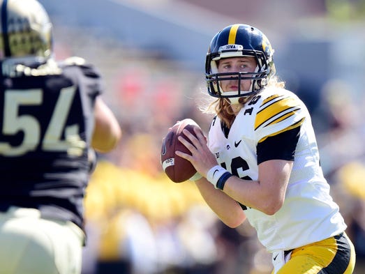 Sep 27, 2014; West Lafayette, IN, USA; Iowa Hawkeyes quarterback C.J. Beathard (16) loos to throw the ball against the Purdue Boilermakers during the first half of the game at Ross Ade Stadium. Mandatory Credit: Marc Lebryk-USA TODAY Sports