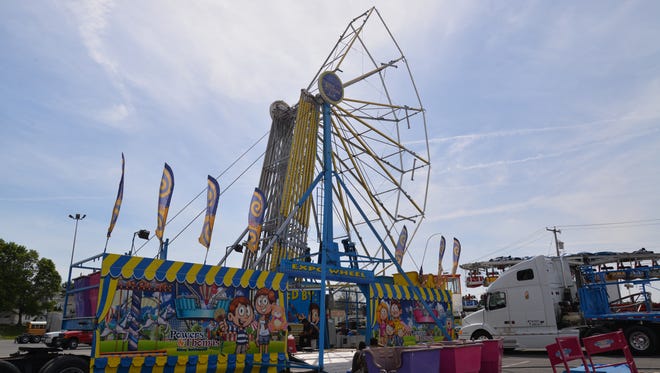 A massive ferris wheel was being constructed at the Staunton Mall on Tuesday, April 19, 2016 for a spring carnival held by the mall.