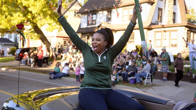MSU graduate and ESPN broadcaster Jemele Hill is the Grand Marshal in the MSU Homecoming Parade in East Lansing, Sept. 26, 2014.