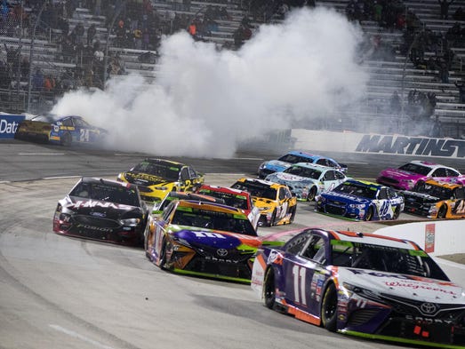 Chase Elliott (top left) crashes into the wall after