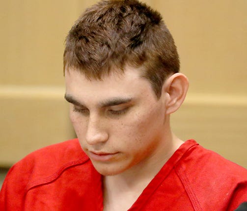 Nikolas Cruz appears in court for a status hearing before Broward Circuit Judge Elizabeth Scherer on Feb, 19 in Ft. Lauderdale, Fla.
