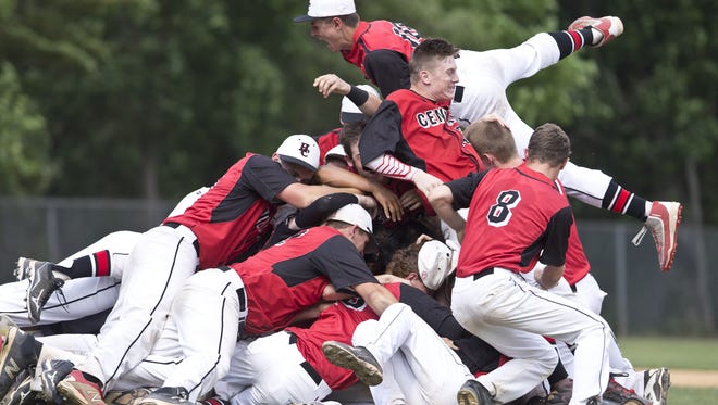 Doug Hood/staff photographer
The Hunterdon Central baseball team celebrates its victory over Morristown in the NJSIAA Group IV final on Saturday.
Hunterdon Central celebrates victory as the game ends. Hunterdon Central defeats Morristown in the NJSIAA Group IV baseball final.Toms River, NJ Saturday, June 11, 2016@dhoodhood