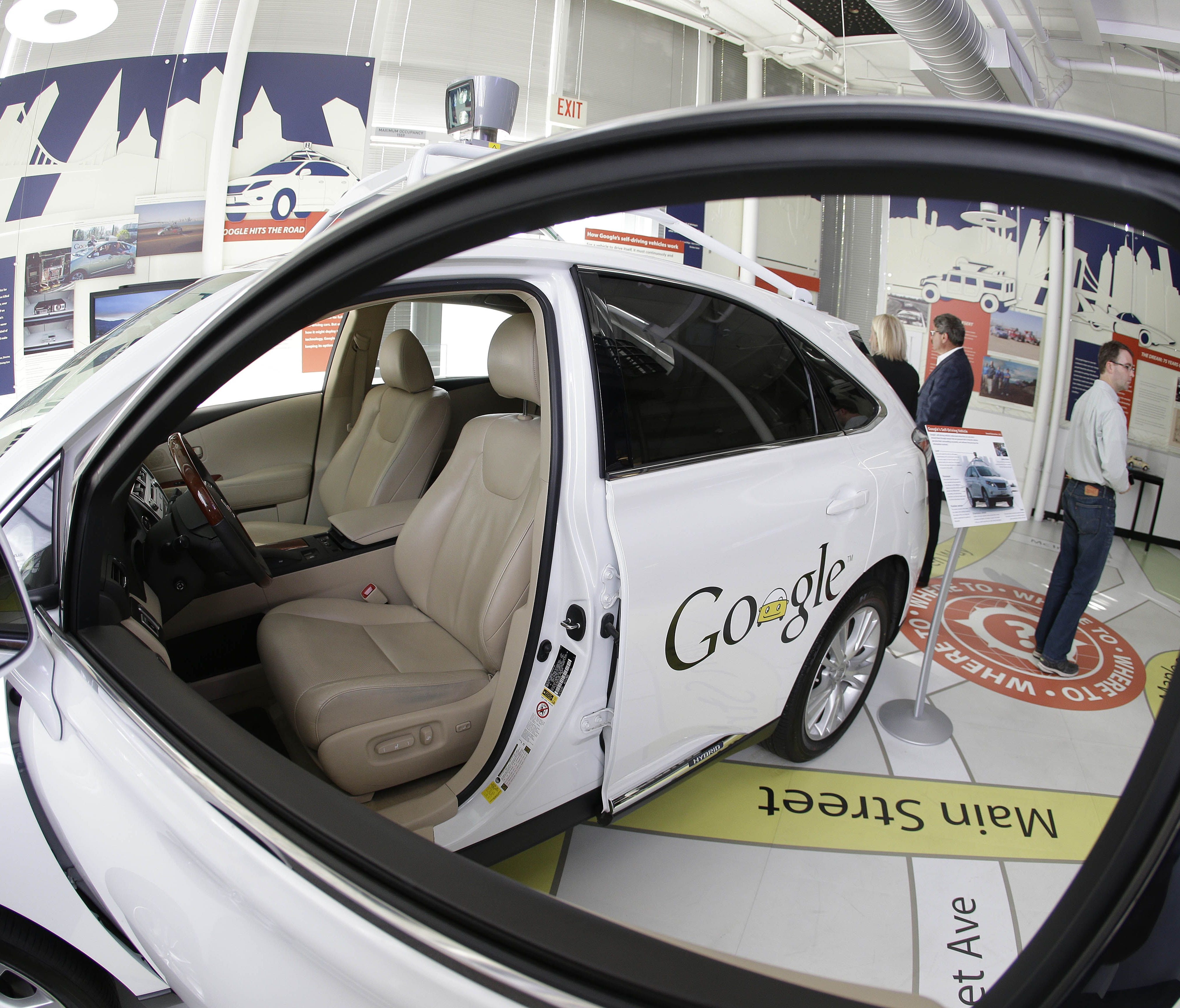 A Google self-driving car is shown in an exhibit at the Computer History Museum in Mountain View, Calif., in 2014