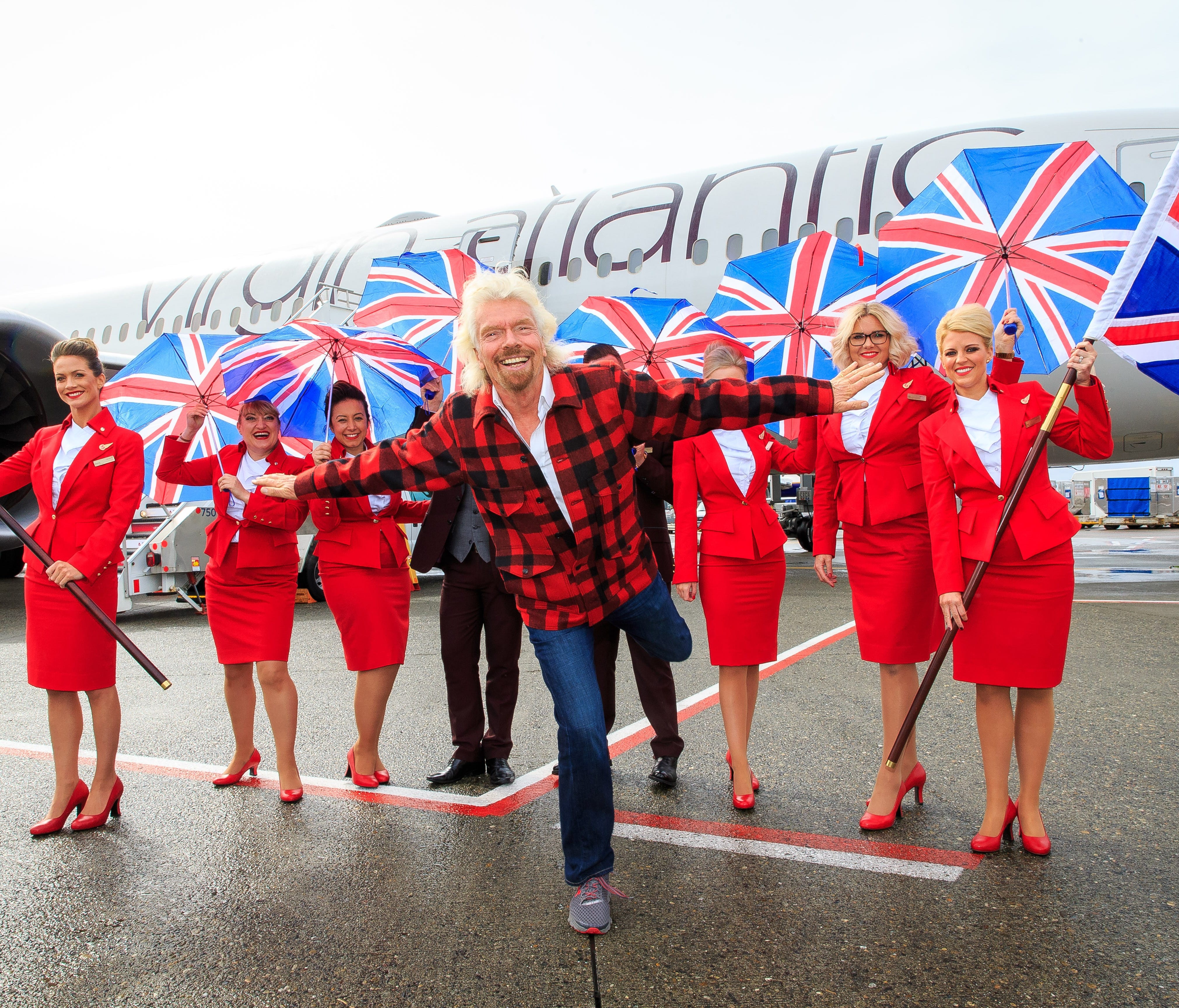Sir Richard Branson, president of Virgin Atlantic, helps launch the carrier's new service between London Heathrow and Seattle-Tacoma International Airport.
