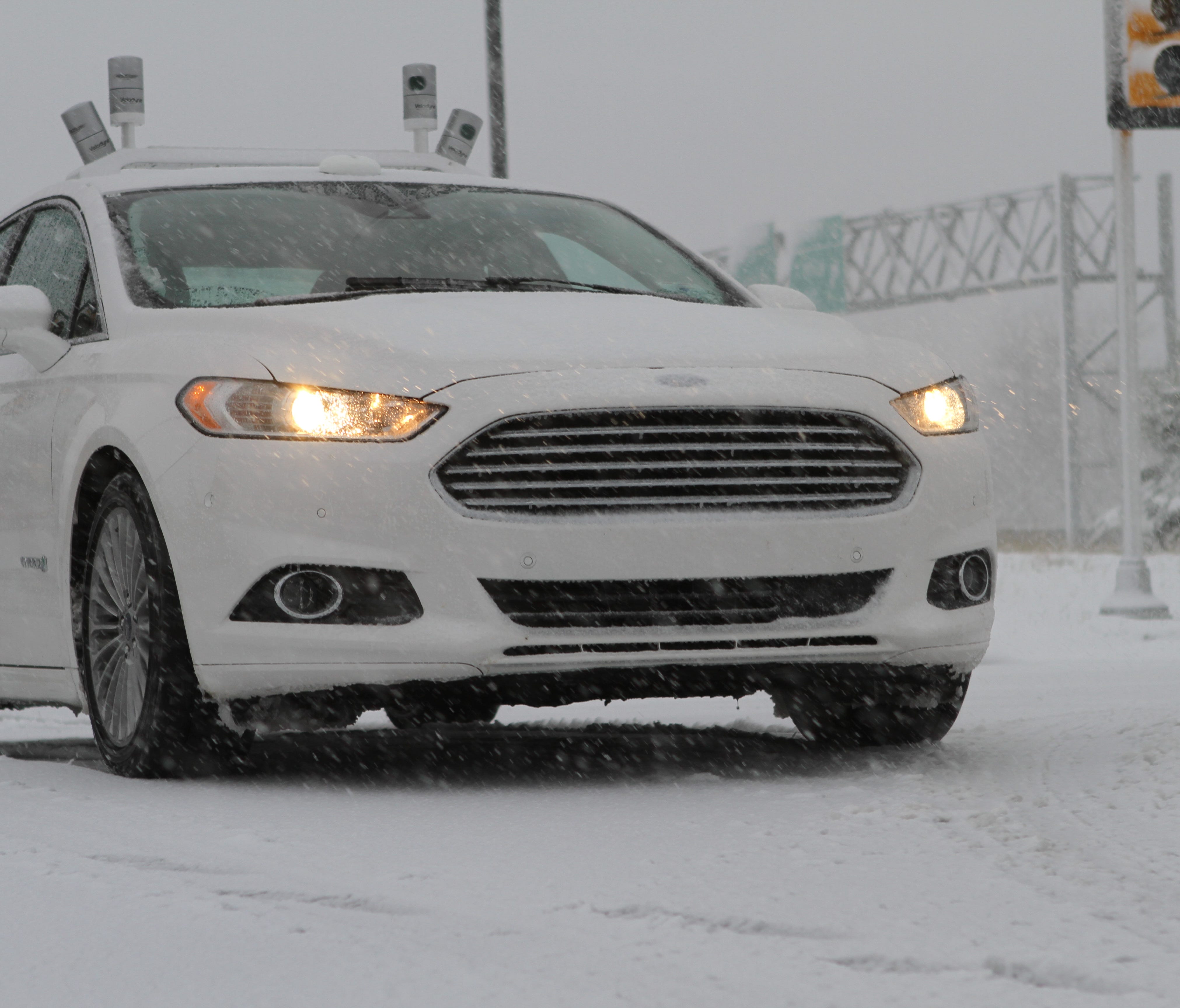 A Ford Fusion laden with self-driving sensors does some winter weather testing.