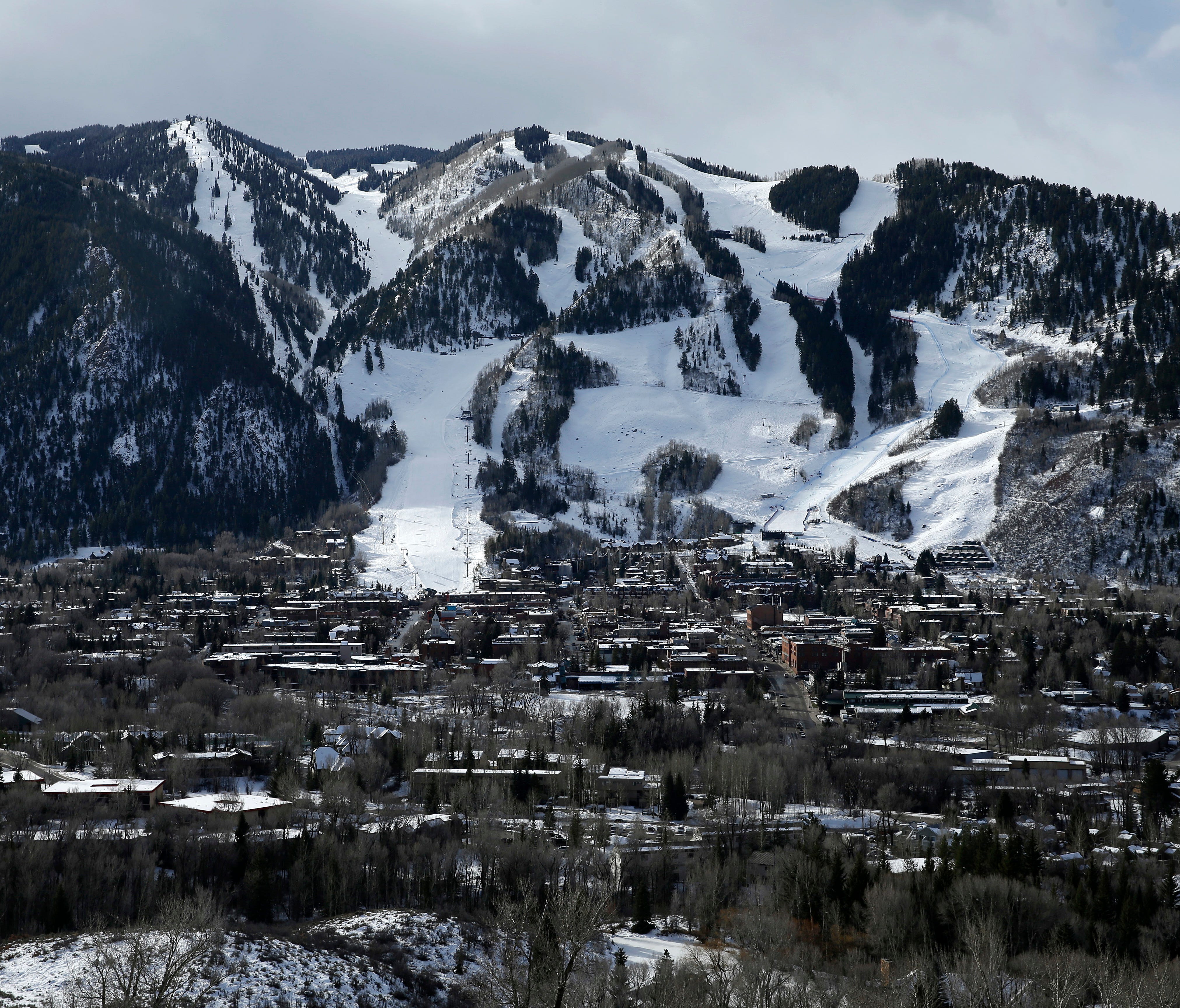 The Aspen Mountain ski area by Aspen, Colo. Aspen Skiing Co., which runs the four Aspen-area ski resorts, has paid $1.5 billion to buy Intrawest, a conglomeration of ski resorts headlined by Steamboat and Winter Park.