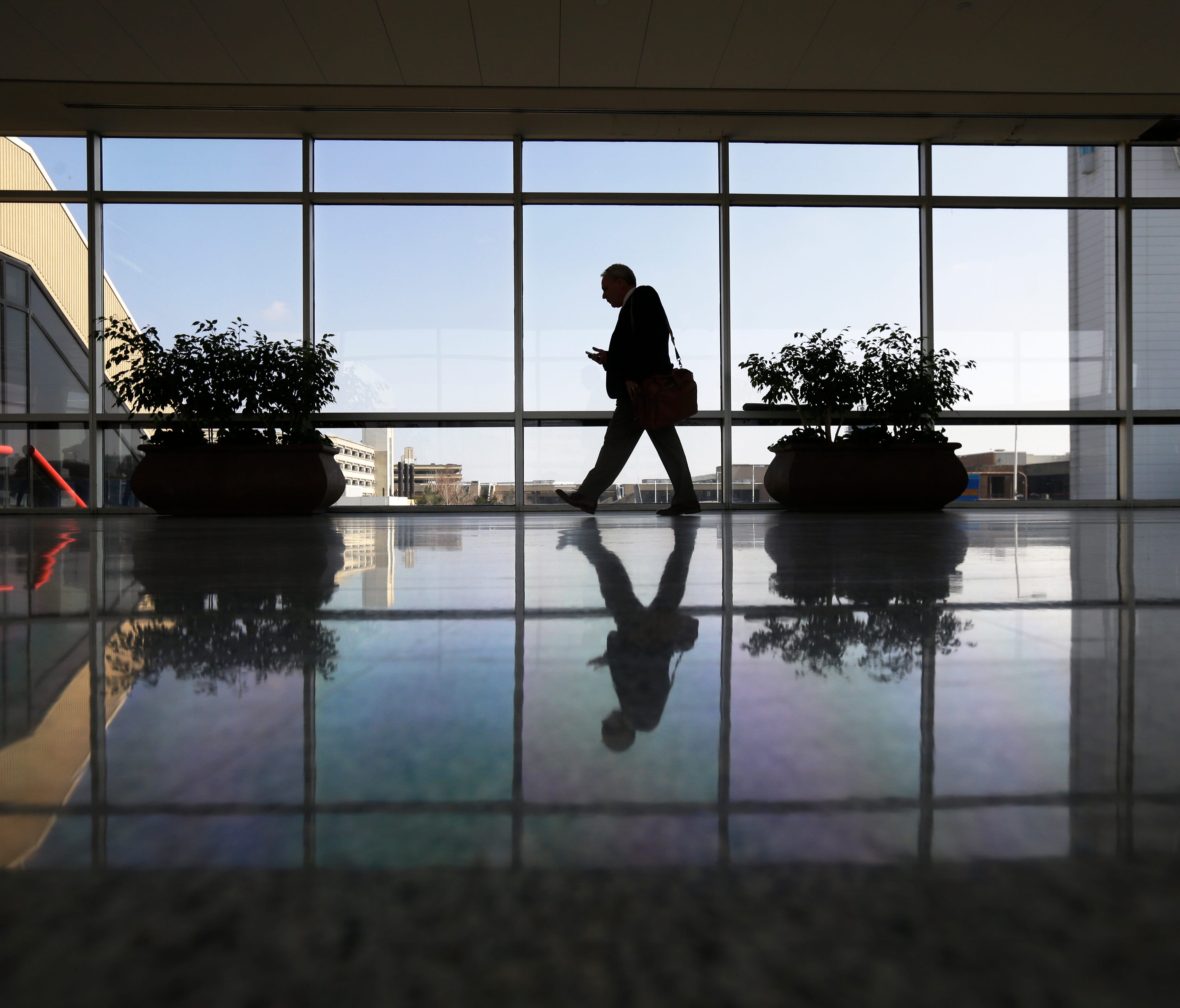 A traveler passes through a corridor at Philadelphia International Airport on Feb. 14, 2013.